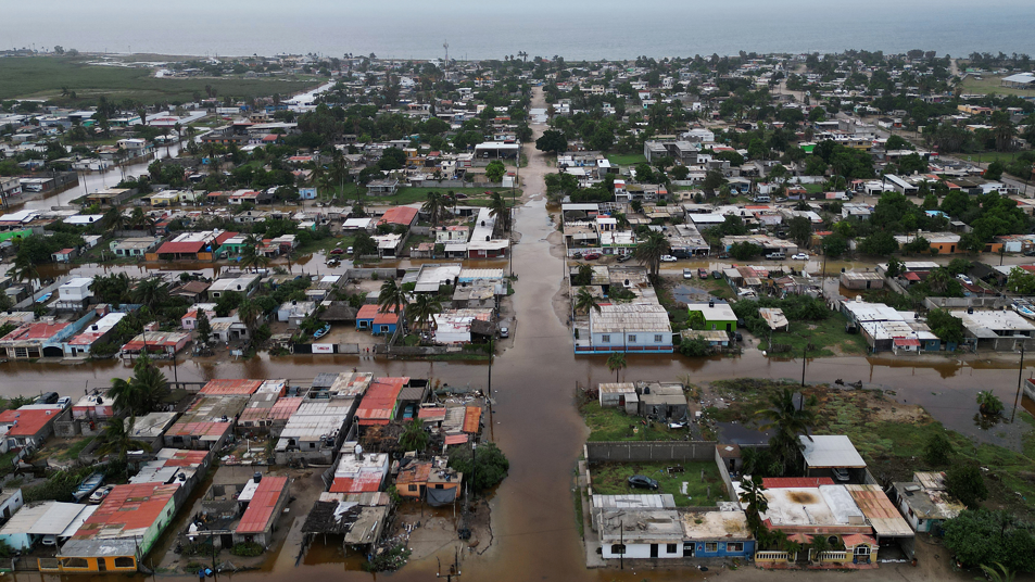 Flooded streets following the arrival of Hurricane Polo in Puerto San Carlos, México