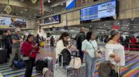 Venezuela's government demands international airlines resume operations within 48 hours, warning of consequences for non-compliance against a backdrop of escalating U.S. military presence in the region.