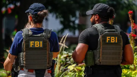 FBI Dismisses Agents for Kneeling at George Floyd Protest: Controversy Surrounds Firings