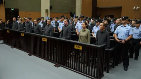 China's Crackdown: 11 Mafia Family Members Sentenced to Death