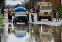 As an Arctic air mass descends from Canada, parts of the northern U.S. brace for extremely low temperatures, while the Pacific Northwest struggles with severe flooding and mudslide threats. Thousands have evacuated from their homes as communities deal with the damaging impact of these weather extremes.