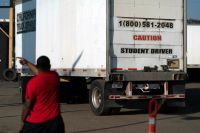 The Trump administration's enforcement of stricter standards for commercial truck drivers may marginally affect the trucking industry while increasing scrutiny on immigrant drivers, raising concerns about their future in this vital sector.