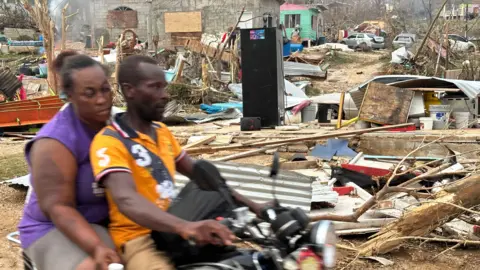 Despair and Resilience: Communities in Jamaica Struggle After Hurricane Melissa
