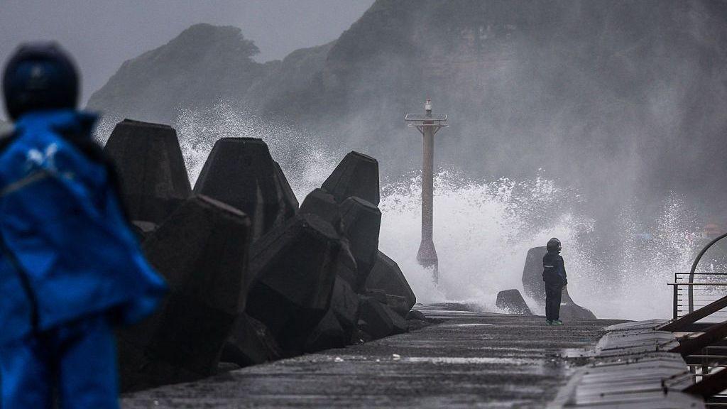 Waves crash against a breakwater during Typhoon Champi