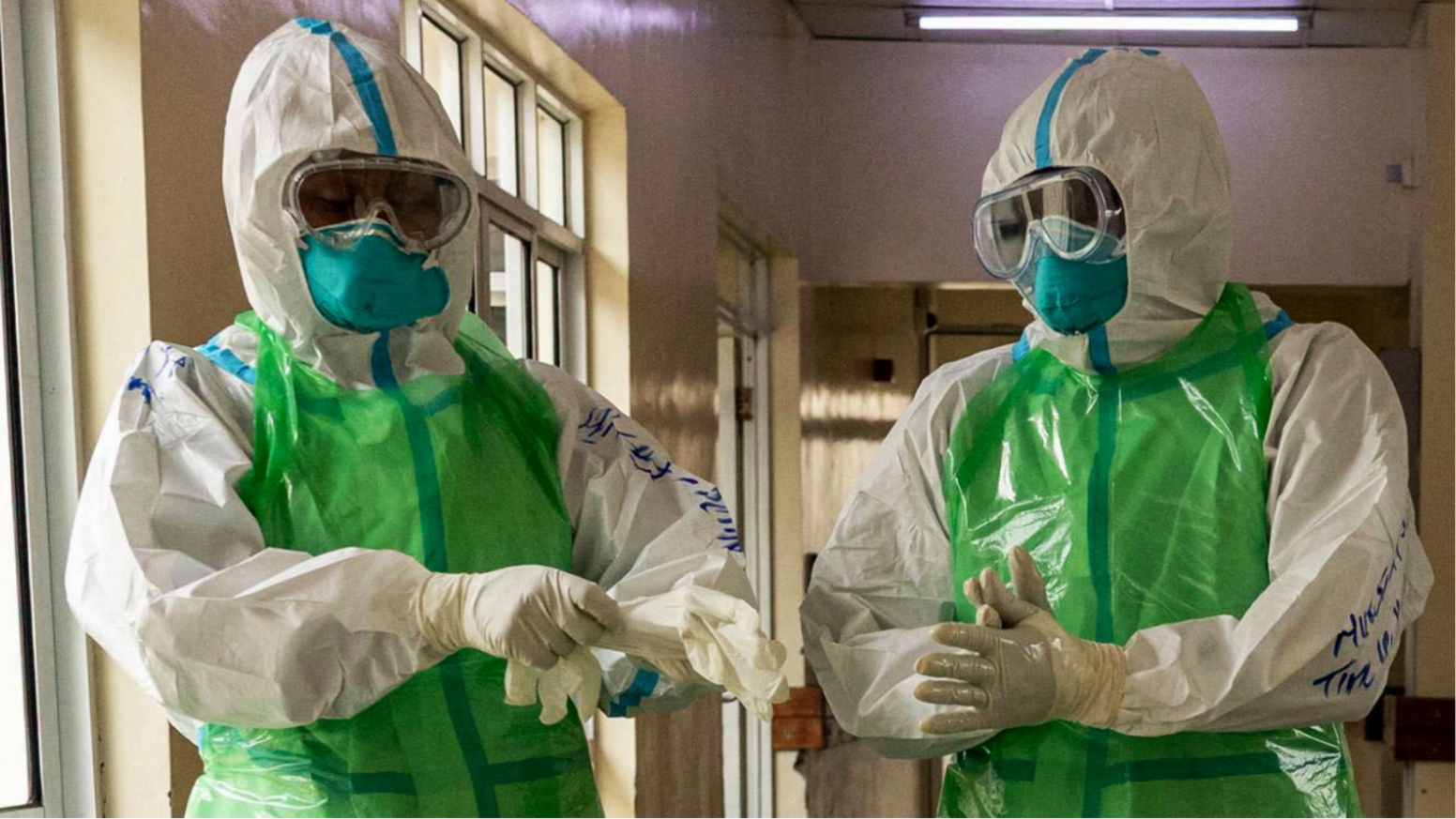 Nurses in PPE preparing to receive Ebola patient in Nairobi simulation