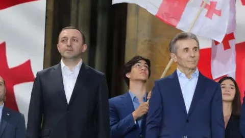 The Dramatic Fall of Georgia's Former Prime Minister Amid Money Laundering Charges