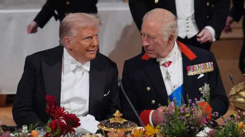 Director Resigns Over Dispute on Trump’s Gift to King Charles