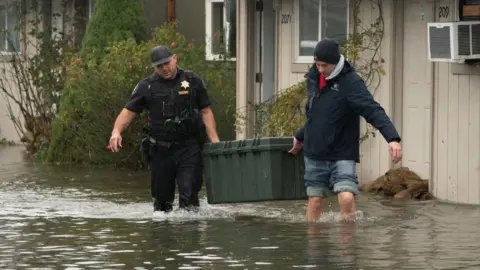 Record Flooding Forces Evacuations in Pacific Northwest